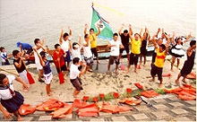 Joyous athletes returning to dry land after the race