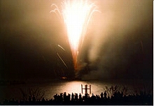 Fireworks launching over the lake